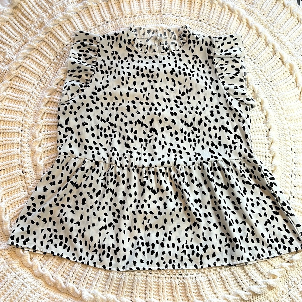 Cream and black high-neck, peplum top